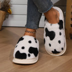 Damespantoffels met koeienprint | Warmte, cocooningcomfort & antislipzool