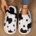 Damespantoffels met koeienprint | Warmte, cocooningcomfort & antislipzool